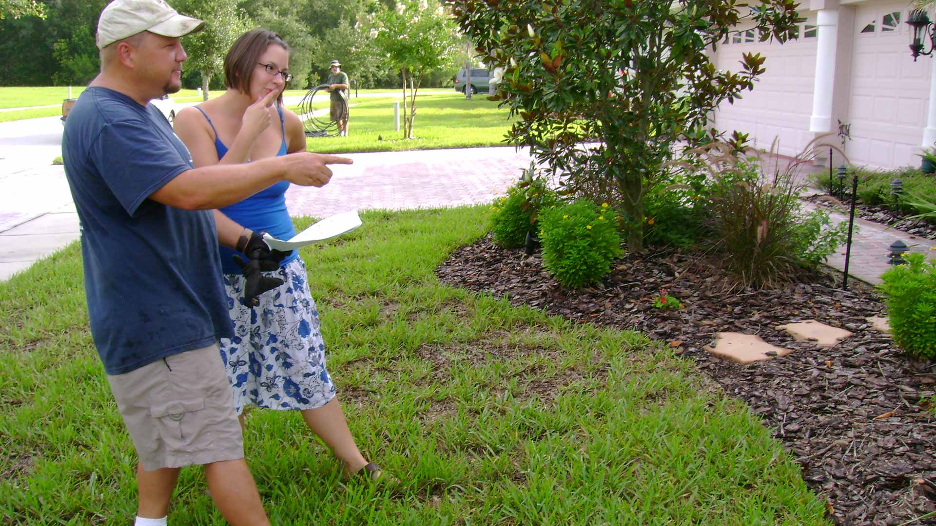 The Garden Gnome owner giving customer design ideas