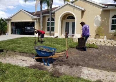 The Garden Gnome installing new sod.